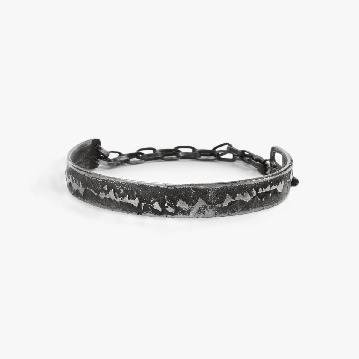 Oxidised sterling silver cuff bracelet with chain and textured surface