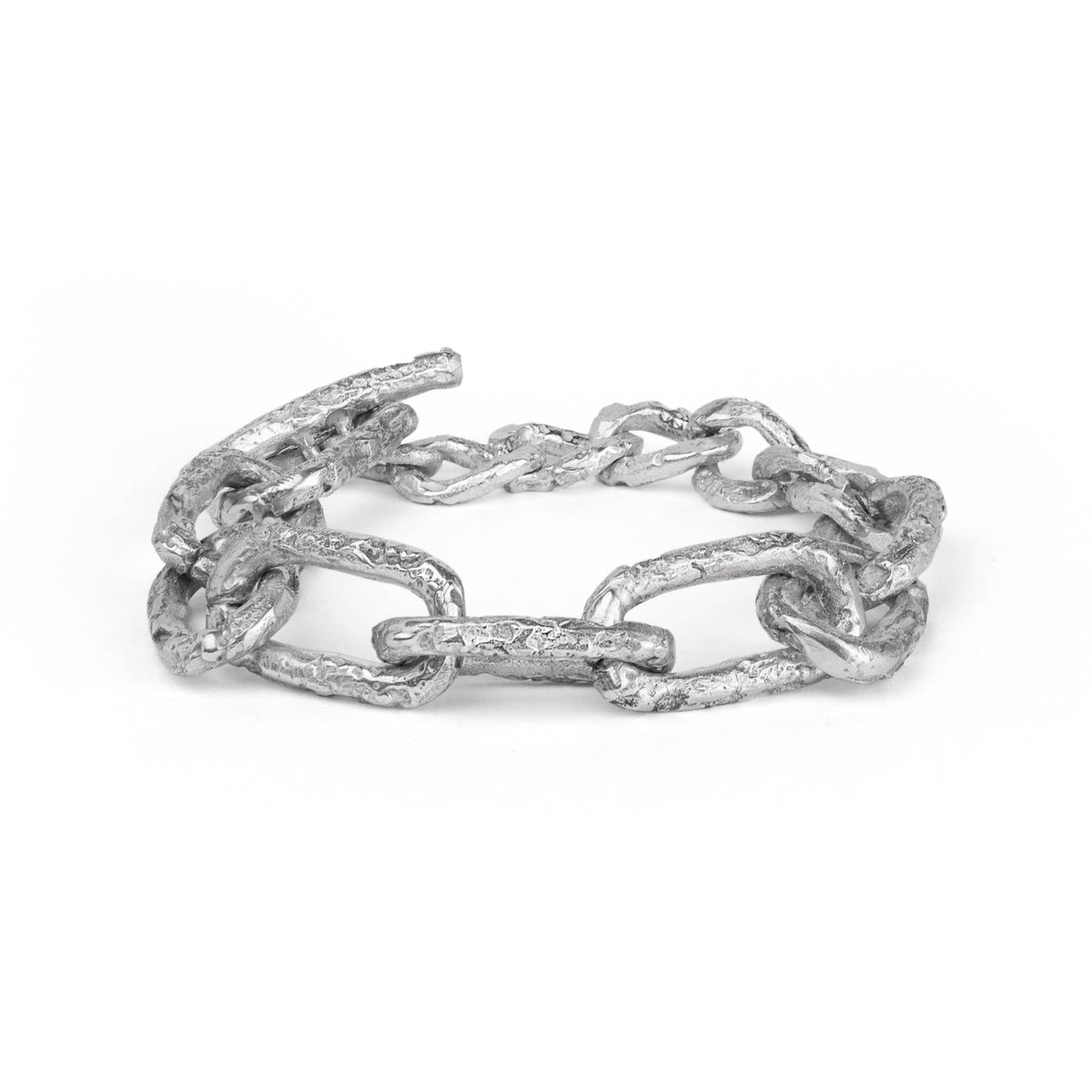 Silver chain bracelet with big textured links on a white background