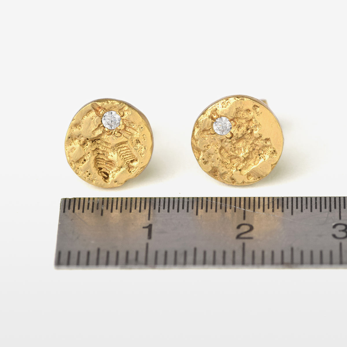 Gold Stud Earrings With A Moissanite Diamond
