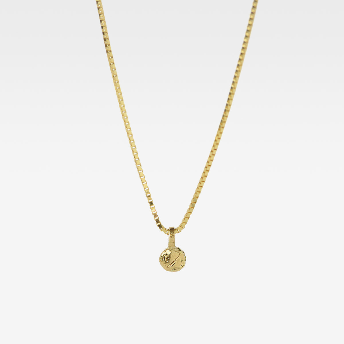 Gold Charm Necklace With Blue Sapphire